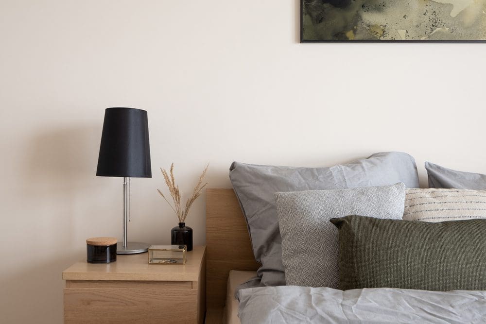 Comfortable,Bed,With,Stylish,,Wooden,Bedside,Table,With,Black,Lamp,