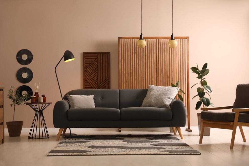 Stylish,Living,Room,Interior,With,Comfortable,Dark,Sofa