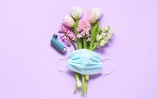 Bouquet,Of,Beautiful,Spring,Flowers,,Inhaler,And,Medical,Mask,On