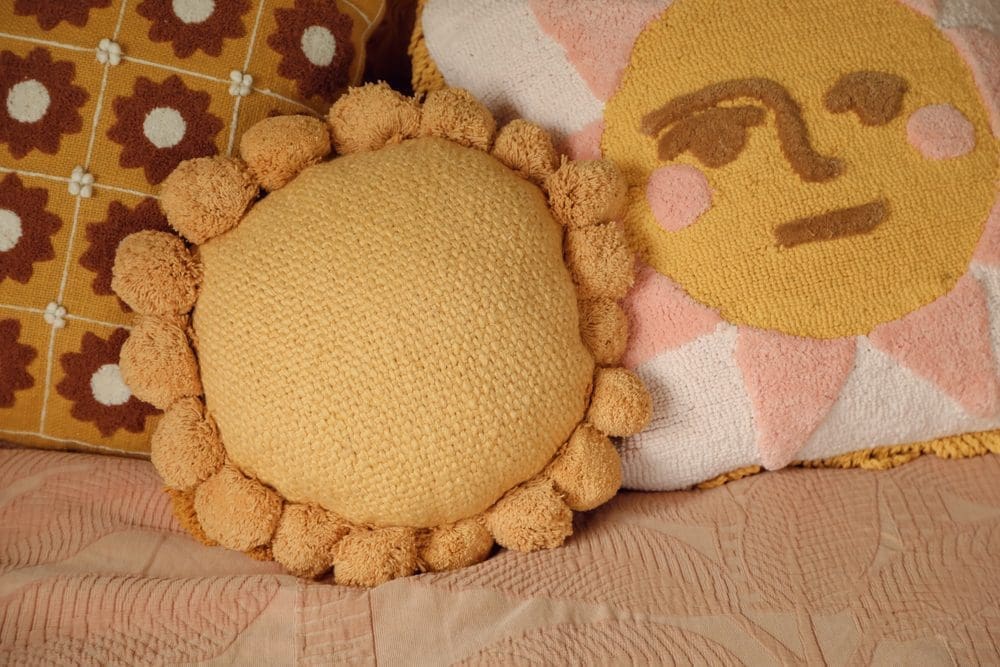 Sunny,Bright,Yellow,Cushions,On,Child's,Bed.,Interior,Decorating.