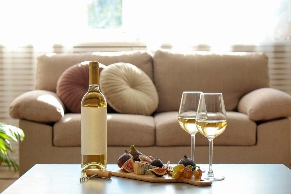 Bottle,Of,A,Vintage,Chardonnay,With,Two,Poured,Glasses,,Figs,