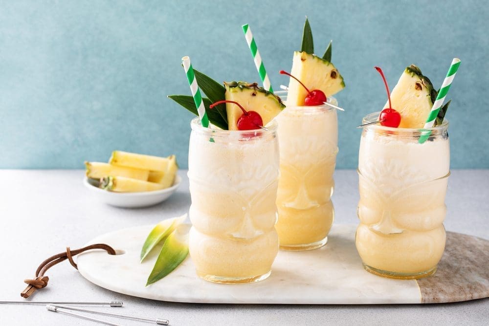 Tropical,Pina,Colada,Cocktail,Or,Mocktail,In,A,Tiki,Glass